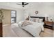 Serene bedroom featuring a plush bed, modern decor, and a private balcony entrance at 2230 W 36Th Ave, Denver, CO 80211