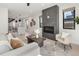 Stylish living room with fireplace, neutral furniture, and modern decor at 2230 W 36Th Ave, Denver, CO 80211