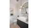 Modern powder room features pendant lighting, a vessel sink, and contemporary fixtures at 2230 W 36Th Ave, Denver, CO 80211