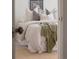 Cozy bedroom with decorative pillows, soft linens, and artwork creates a relaxing atmosphere at 1185 S Steele St, Denver, CO 80210