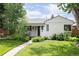 Charming home with a well-maintained lawn and appealing curb appeal at 1185 S Steele St, Denver, CO 80210