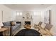 Cozy living room with fireplace, comfortable seating, and stylish decor creating a warm and inviting space at 1185 S Steele St, Denver, CO 80210