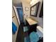 Compact bathroom featuring a vanity with granite countertop and modern fixtures at 4449 S Xavier St, Denver, CO 80236