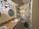 Cozy bathroom with bright yellow walls, white tile accents, and a modern vanity with sink at 4449 S Xavier St, Denver, CO 80236
