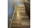 Attractive wood-look floors with baseboard trim at 4449 S Xavier St, Denver, CO 80236