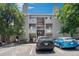 Apartment complex featuring a light gray color scheme and convenient parking at 3600 S Pierce St # 2-201, Lakewood, CO 80235