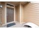 Front door is brown with the house number on the siding above at 8779 S Kipling Way # 204, Littleton, CO 80127