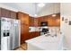 Well-equipped kitchen featuring granite countertops and stainless steel appliances at 8779 S Kipling Way # 204, Littleton, CO 80127