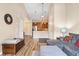 Bright living room featuring modern furnishings and neutral decor at 8779 S Kipling Way # 204, Littleton, CO 80127
