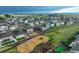 This neighborhood has a playground and many homes that have well maintained lawns at 2303 Monte Vista St, Fort Lupton, CO 80621