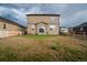 The home includes a spacious backyard, great for outdoor relaxation, and Gathering activities at 2303 Monte Vista St, Fort Lupton, CO 80621