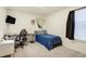 Charming bedroom with a desk, decor and comfortable bed at 2303 Monte Vista St, Fort Lupton, CO 80621