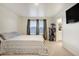 Comfortable bedroom with natural light and soft carpet at 2303 Monte Vista St, Fort Lupton, CO 80621
