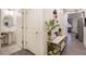 Bright foyer featuring a pedestal sink and decoratively styled console table at 2303 Monte Vista St, Fort Lupton, CO 80621
