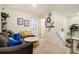 Cozy living room featuring comfortable seating, stylish decor and plenty of natural light at 2303 Monte Vista St, Fort Lupton, CO 80621