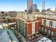 Breathtaking aerial shot of a luxury condo complex featuring city views and modern architecture at 1950 N Logan St # 1109, Denver, CO 80203