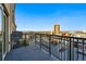 This balcony offers city views and has black iron railings at 1950 N Logan St # 1109, Denver, CO 80203