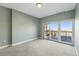 Light and airy bedroom with sliding door to private balcony with city views at 1950 N Logan St # 1109, Denver, CO 80203
