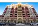 Upscale condo building with brick and stone exterior and balconies is located in a desirable neighborhood at 1950 N Logan St # 1109, Denver, CO 80203