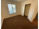 Bright bedroom with large window and walk-in closet at 14010 Shannon Dr, Broomfield, CO 80023