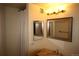 Bathroom featuring vanity, mirror and sconce lighting at 720 16Th St # 513, Denver, CO 80202