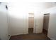 Bedroom featuring neutral carpet and an open closet at 720 16Th St # 513, Denver, CO 80202