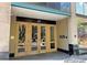 Close up of the main entrance with glass doors to the building numbered 720 at 720 16Th St # 513, Denver, CO 80202