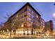 Attractive exterior view of the building at dusk with street view and pedestrian activity at 720 16Th St # 513, Denver, CO 80202