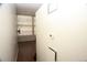 Hallway leading to a room with large windows with blinds at 720 16Th St # 513, Denver, CO 80202