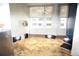 A bright living room with a large round table, city views, and contemporary lighting at 720 16Th St # 513, Denver, CO 80202