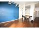 Spacious living room featuring an open layout with hardwood floors and open concept kitchen at 720 16Th St # 513, Denver, CO 80202
