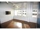 Living room with lots of windows and natural light; with a wall-mounted TV at 720 16Th St # 513, Denver, CO 80202