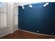 Well lit room with track lighting and hardwood floors at 720 16Th St # 513, Denver, CO 80202