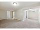 Finished basement featuring neutral carpet, light walls, and recessed lighting at 9054 Dover St, Westminster, CO 80021