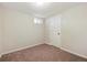 Basement bedroom with a neutral carpet and white walls and a small window at 9054 Dover St, Westminster, CO 80021