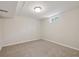Basement bedroom featuring neutral carpet and white walls and a small window at 9054 Dover St, Westminster, CO 80021