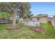Well-manicured backyard featuring a deck, above-ground pool, storage shed and mature trees, ideal for outdoor living at 5704 Ammons St, Arvada, CO 80002