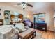 Inviting living room featuring hardwood floors and an open layout connecting to the kitchen at 5704 Ammons St, Arvada, CO 80002