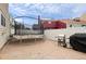 Spacious backyard featuring a trampoline, grill, and white fence at 19616 E Milan Cir, Aurora, CO 80013