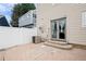 Backyard with patio, privacy fence and exterior door at 19616 E Milan Cir, Aurora, CO 80013