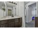 Bathroom vanity with marble countertop and decorative lighting at 19616 E Milan Cir, Aurora, CO 80013