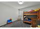 Bedroom featuring a wooden bunkbed and carpeted flooring at 19616 E Milan Cir, Aurora, CO 80013