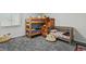 Bedroom featuring a wooden bunkbed and carpeted flooring at 19616 E Milan Cir, Aurora, CO 80013