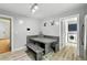 Cozy dining area features a wooden table with bench seating and modern lighting at 19616 E Milan Cir, Aurora, CO 80013