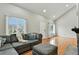 Spacious living room features hardwood floors, vaulted ceilings, and a comfortable seating area at 19616 E Milan Cir, Aurora, CO 80013