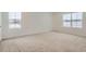 Spacious bedroom with neutral carpeting and large windows at 250 Paloma Way, Elizabeth, CO 80107