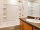Well-lit bathroom with a shower-tub combination and vanity at 20768 Randolph Pl, Denver, CO 80249