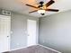 Bedroom featuring neutral gray walls, and carpet at 20768 Randolph Pl, Denver, CO 80249
