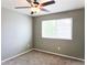 Bedroom featuring neutral gray walls, and carpet at 20768 Randolph Pl, Denver, CO 80249