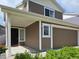 Beautifully maintained home featuring a two-car garage, covered porch and charming curb appeal at 20768 Randolph Pl, Denver, CO 80249